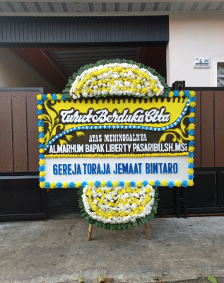 Papan Bunga Duka di Mokoau